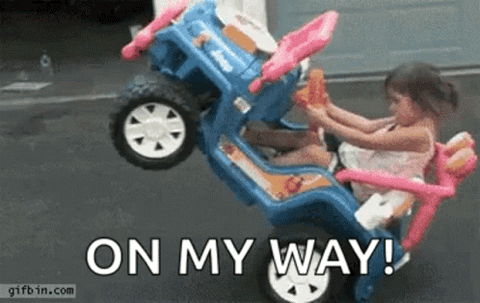 Little girl driving a toy car and crashing, "On my way!"
