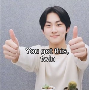 Young man giving two thumbs up with a confident smile captioned 'You got this, twin'