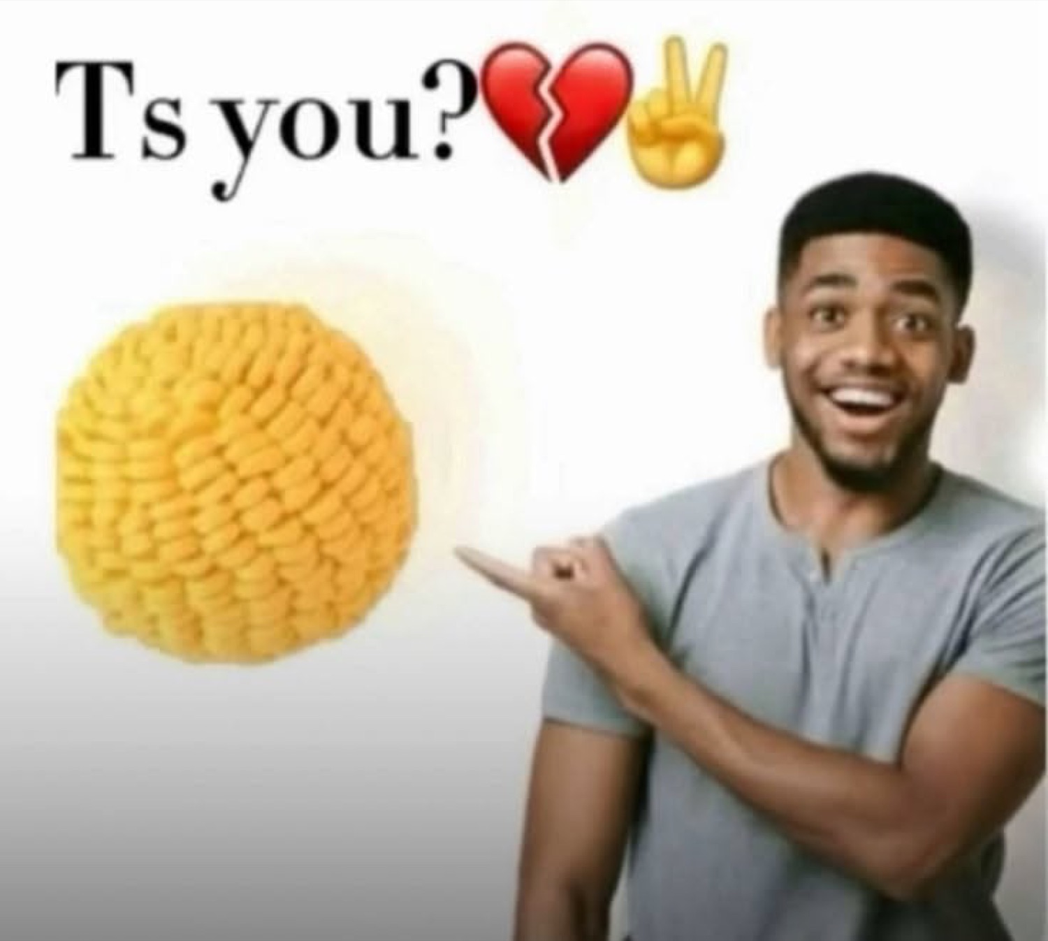 Excited guy pointing at a yellow corn puff ball with the caption 'Ts you?'