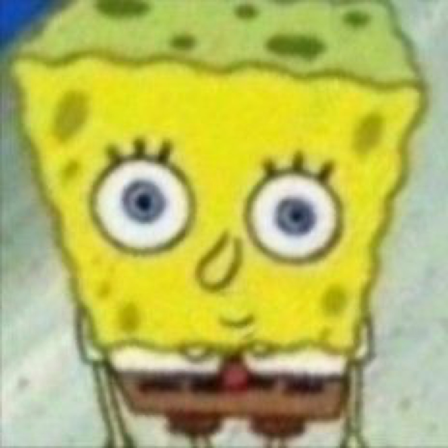 SpongeBob looking sweaty and wide-eyed with a nervous grin