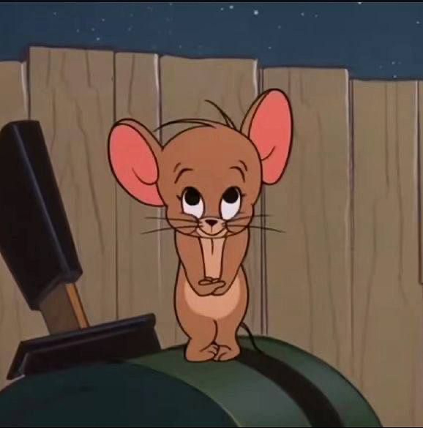 Jerry from Tom and Jerry standing timidly with arms folded, looking small and worried