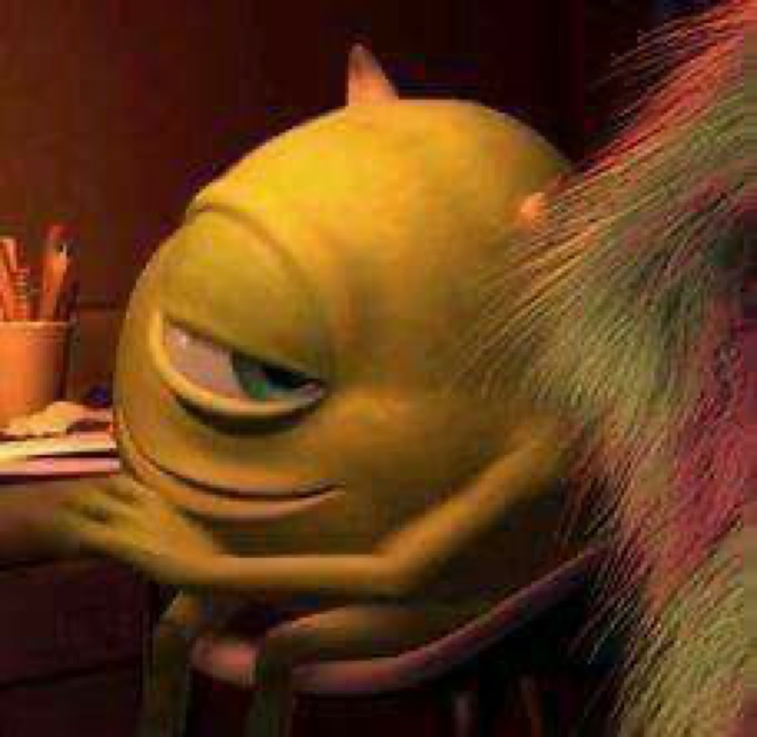 Mike Wazowski resting his chin on his hand with a sly, smug side-eye