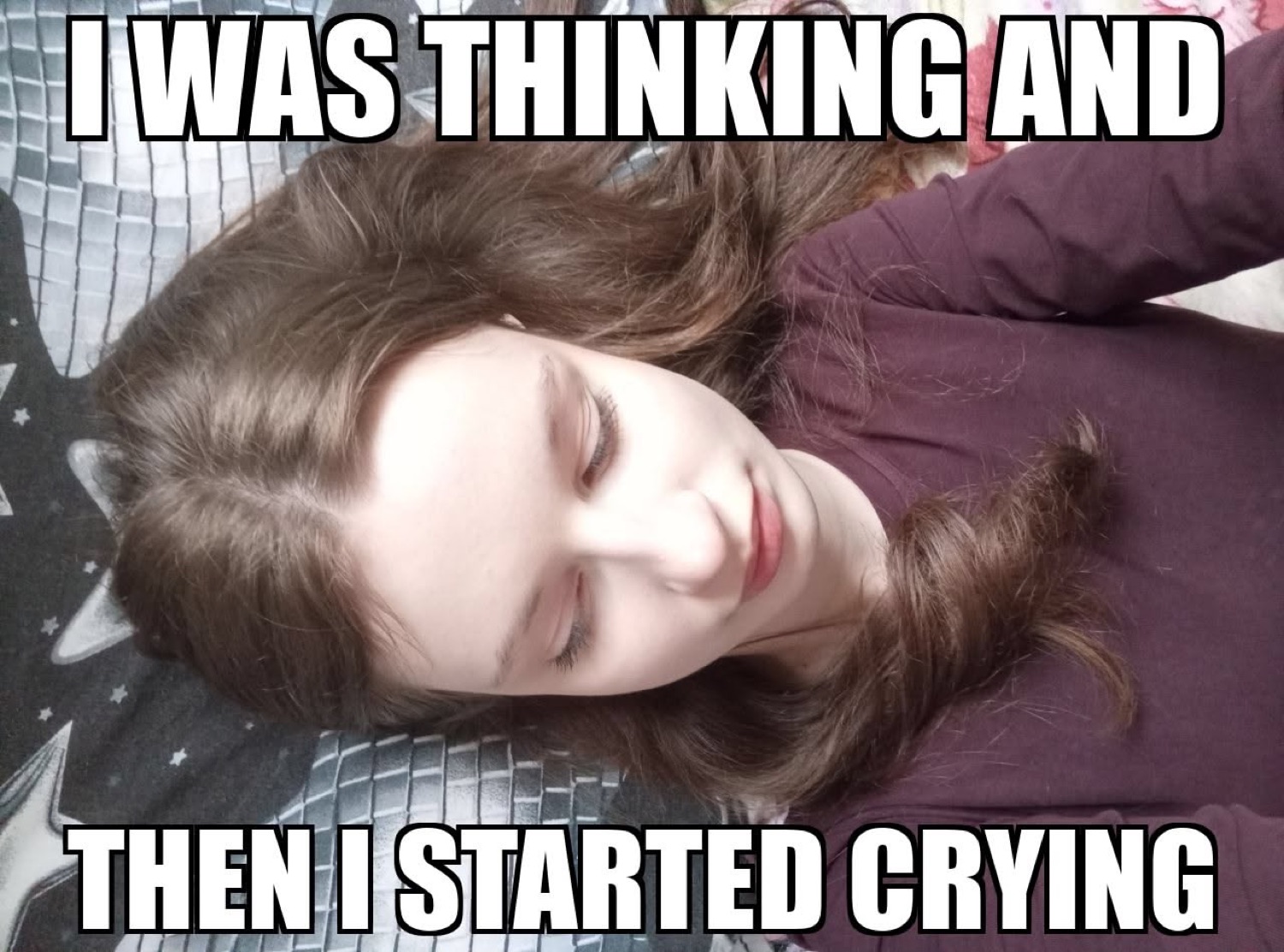 Woman lying down with eyes closed, captioned 'I was thinking and then I started crying'