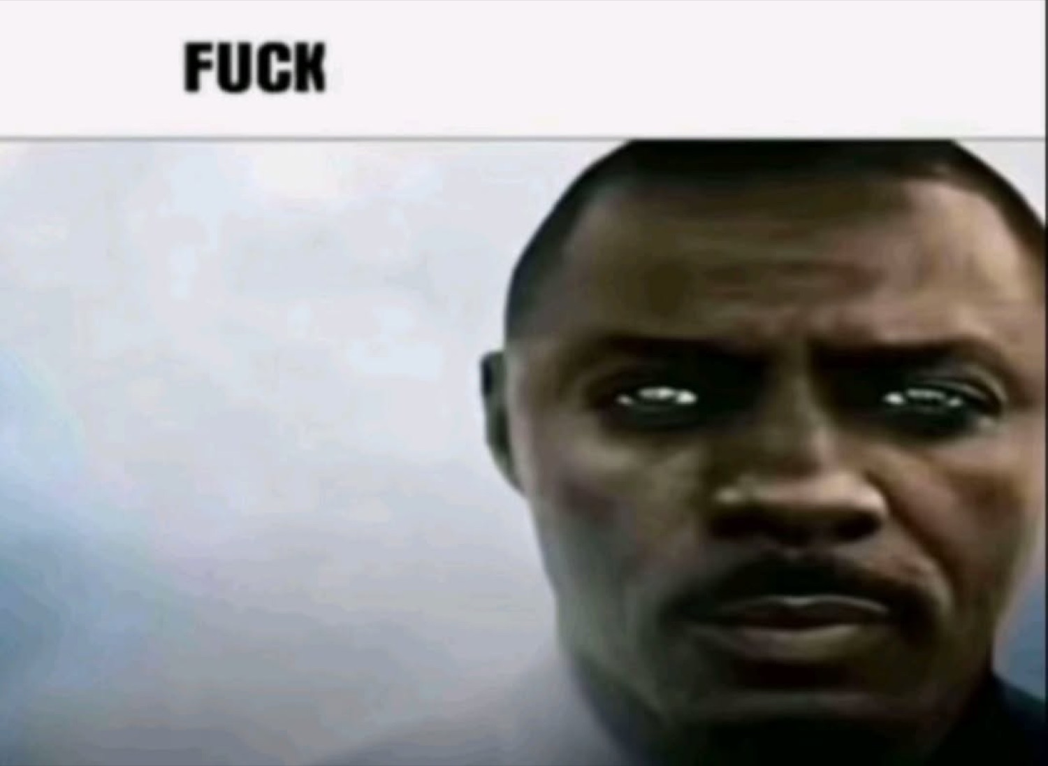 Man staring blankly ahead with the single-word caption 'FUCK'
