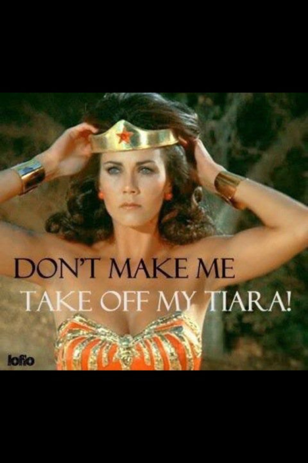 Wonder Woman adjusting her tiara: 'DON'T MAKE ME TAKE OFF MY TIARA!'