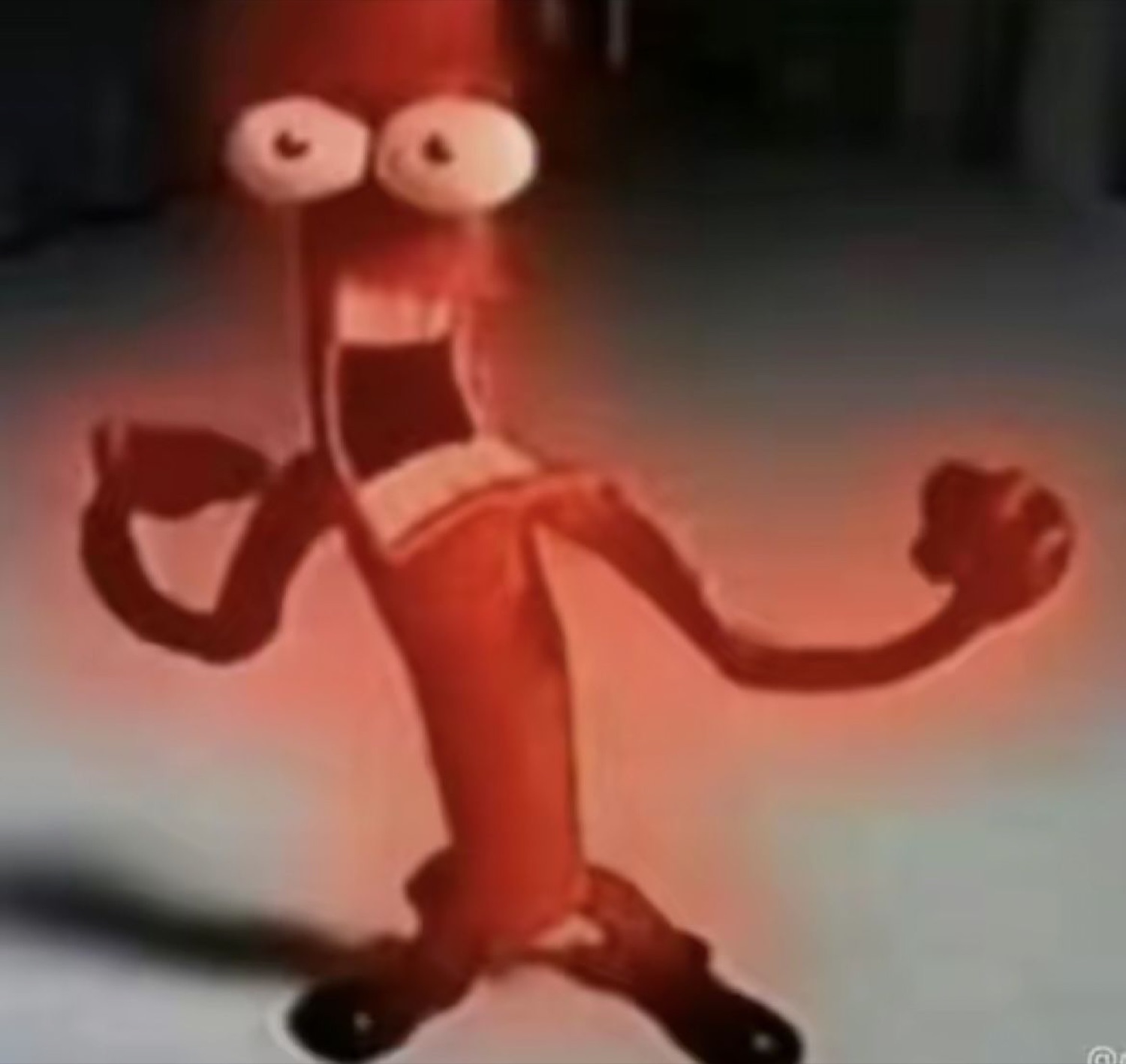 Wobbly red claymation figure with bug eyes flailing in a panicked dance