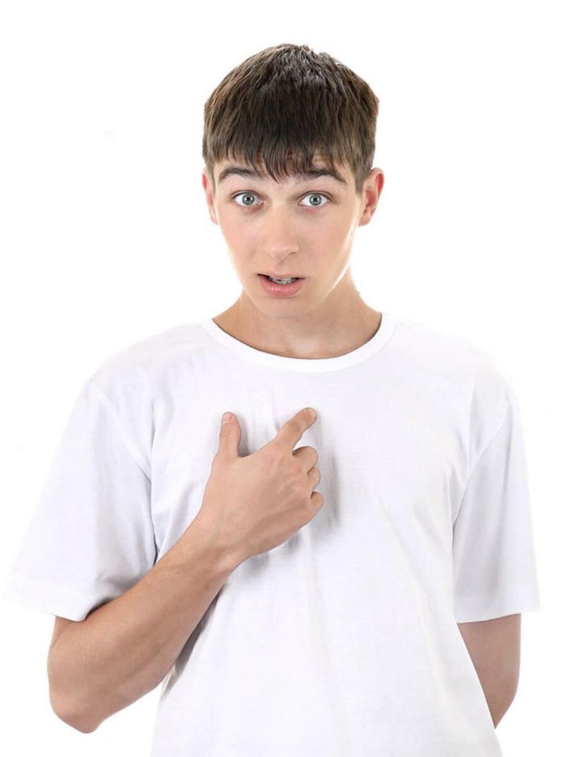Wide-eyed teen in a white tee pointing at himself with a stunned who-me look