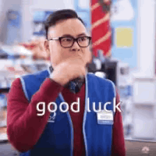 Mateo from Superstore in a blue vest sarcastically saying "good luck"