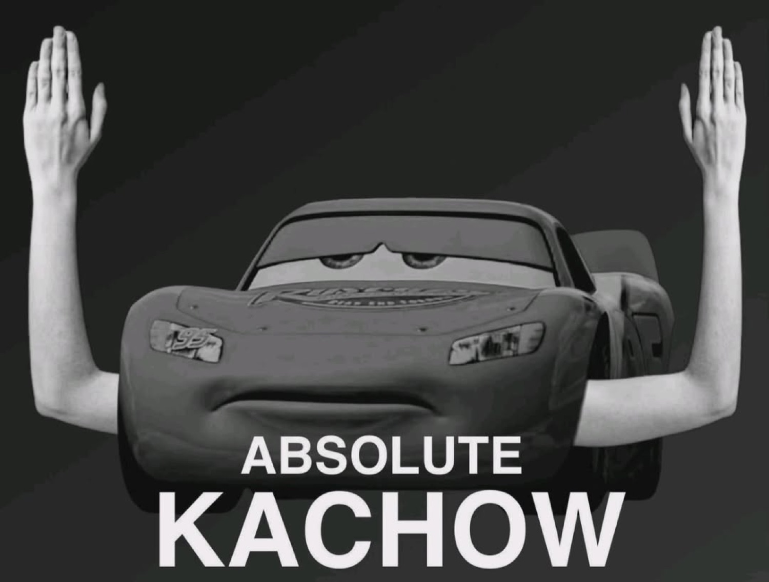 Gray McQueen with human arms raised: 'ABSOLUTE KACHOW'