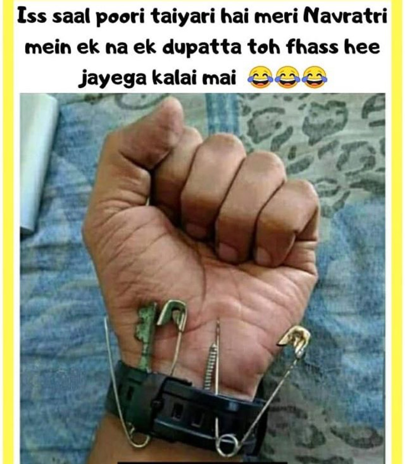 Fist with safety pins on a watch strap: 'Iss saal poori taiyari hai meri Navratri mein ek na ek dupatta toh fhass hee jayega kalai mai 😂' (fully prepared, some dupatta is getting caught on my wrist this Navratri)