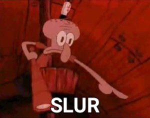 Squidward pointing flatly with the word 'SLUR' captioned in a red-tinted scene