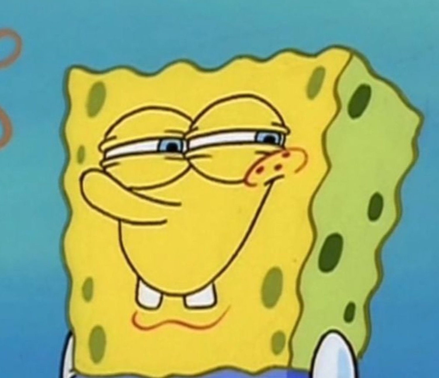 SpongeBob squinting with a sly grin, clearly plotting something