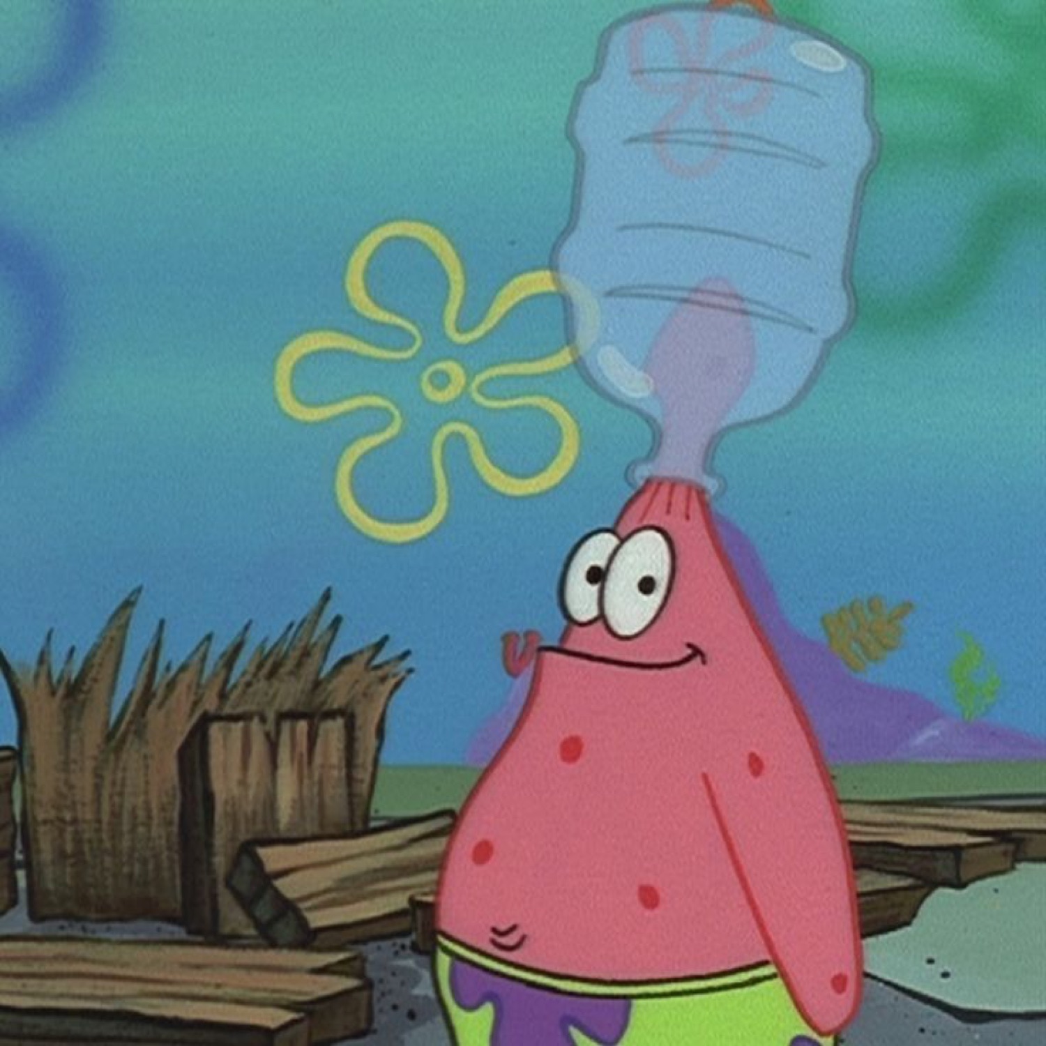Patrick Star standing with a water jug stuck on his head, smiling at nothing