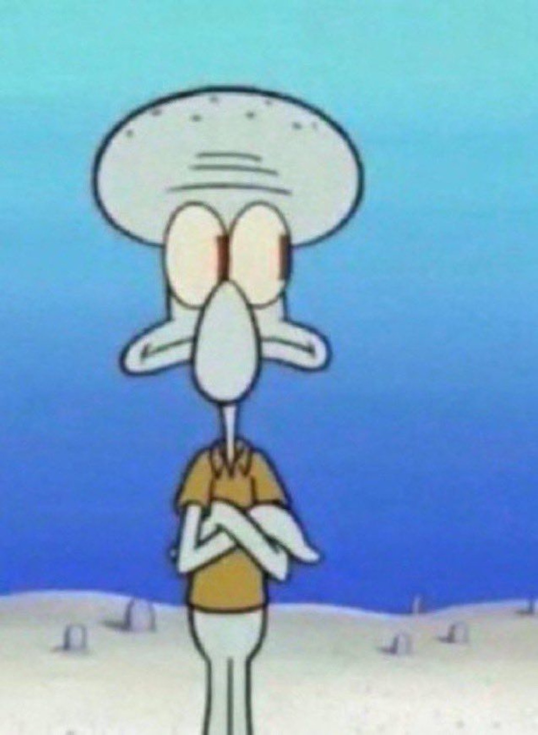 Squidward standing gloomily with arms crossed in a barren, gravestone-dotted field