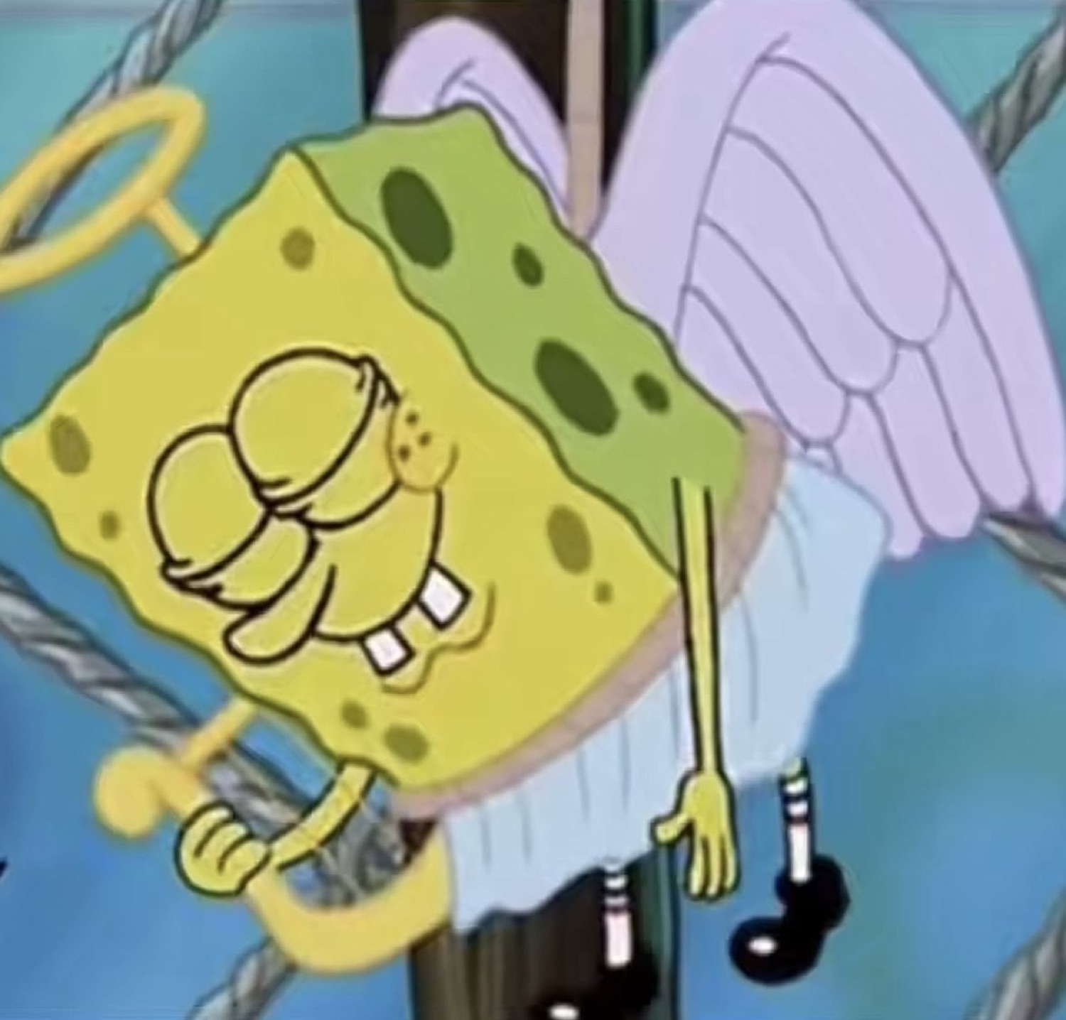 SpongeBob floating as a halo-wearing angel with his eyes shut and hands folded