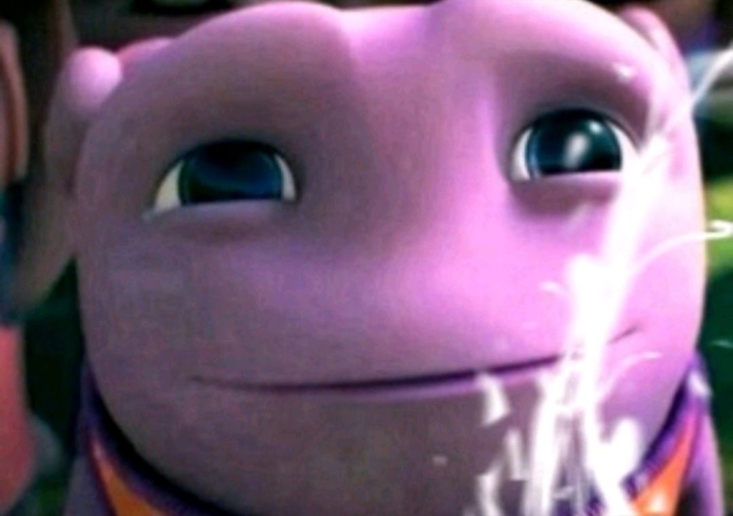 Purple alien grinning slyly to himself with sparkles drifting past