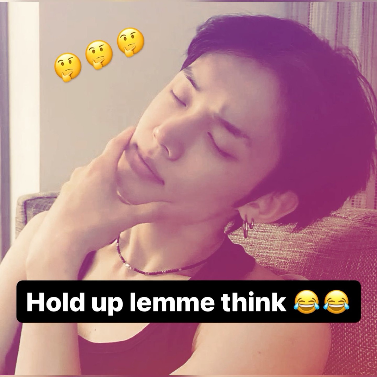 Person eyes-closed with hand on chin captioned 'Hold up lemme think'
