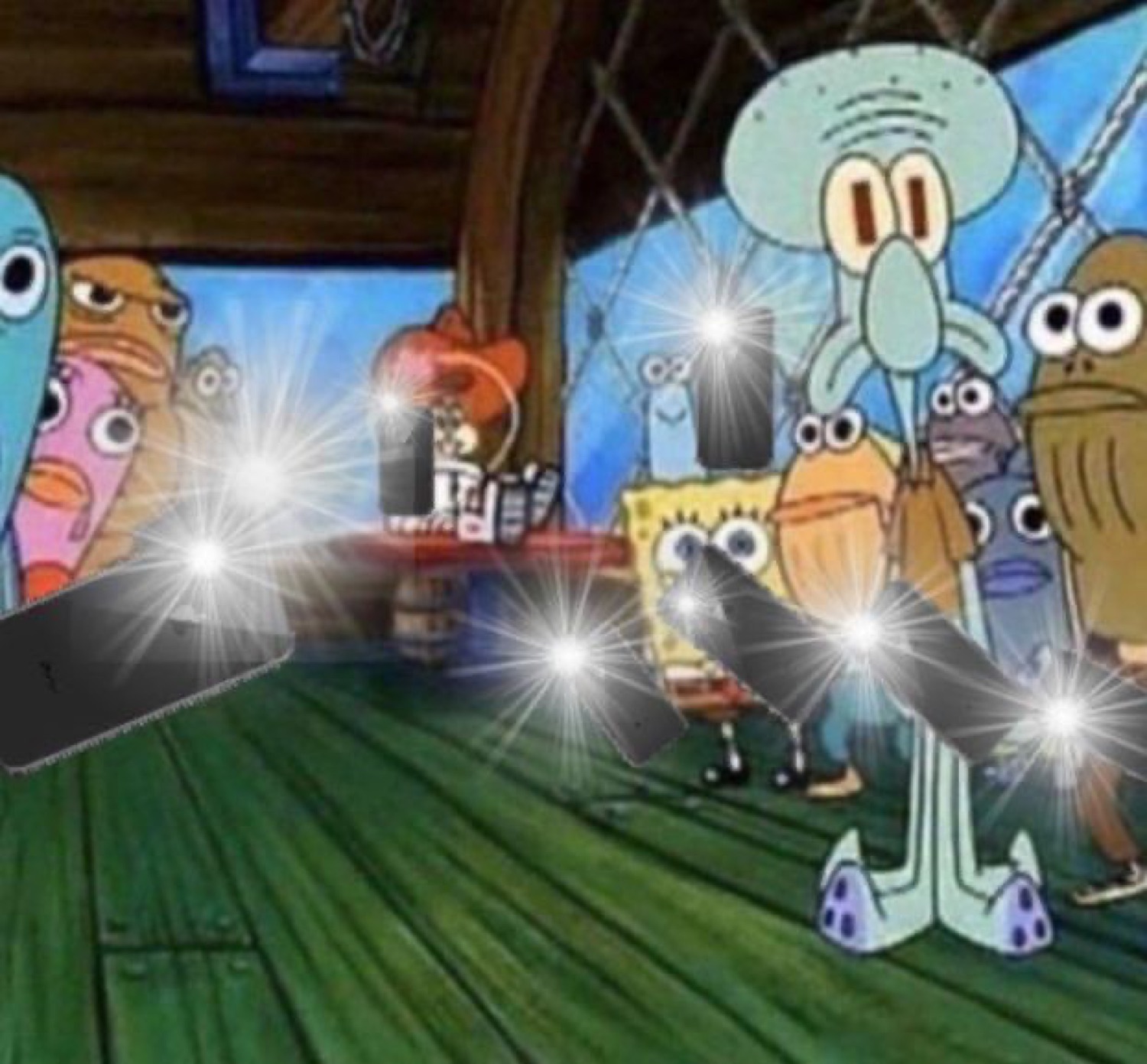 Bikini Bottom fish crowd raising glowing phone lights like a concert