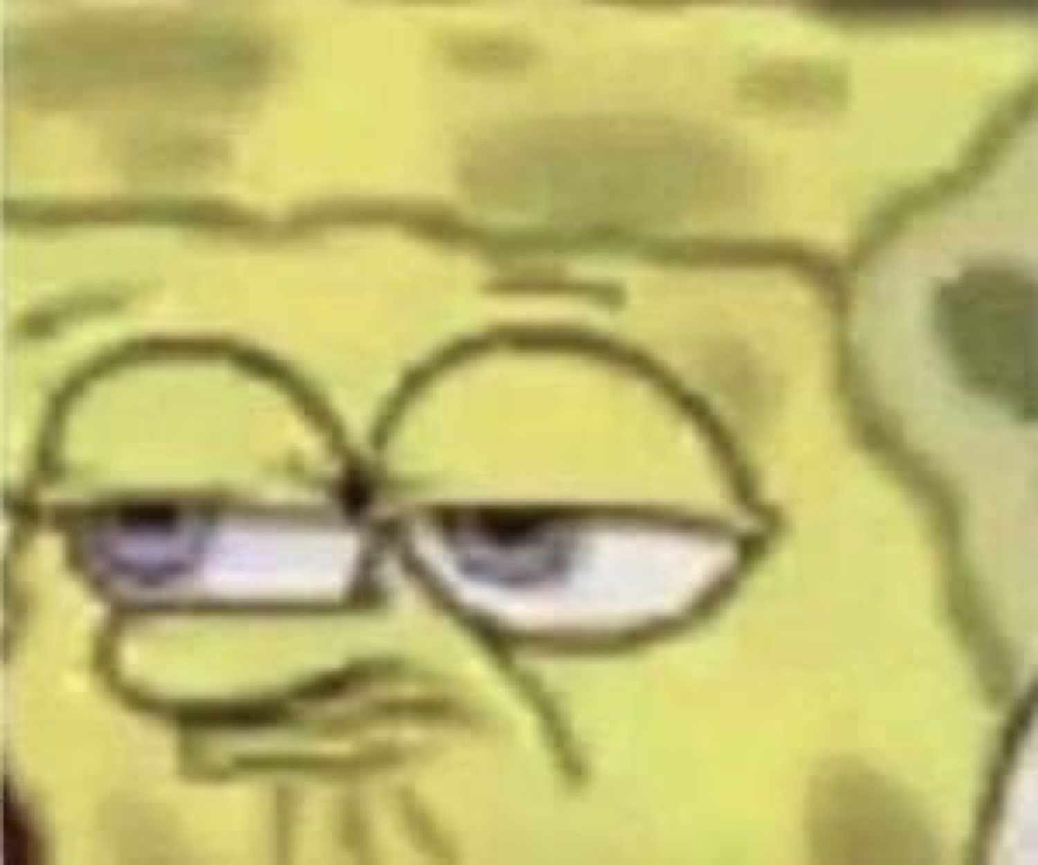 Close-up of SpongeBob with heavy-lidded, half-asleep unimpressed eyes