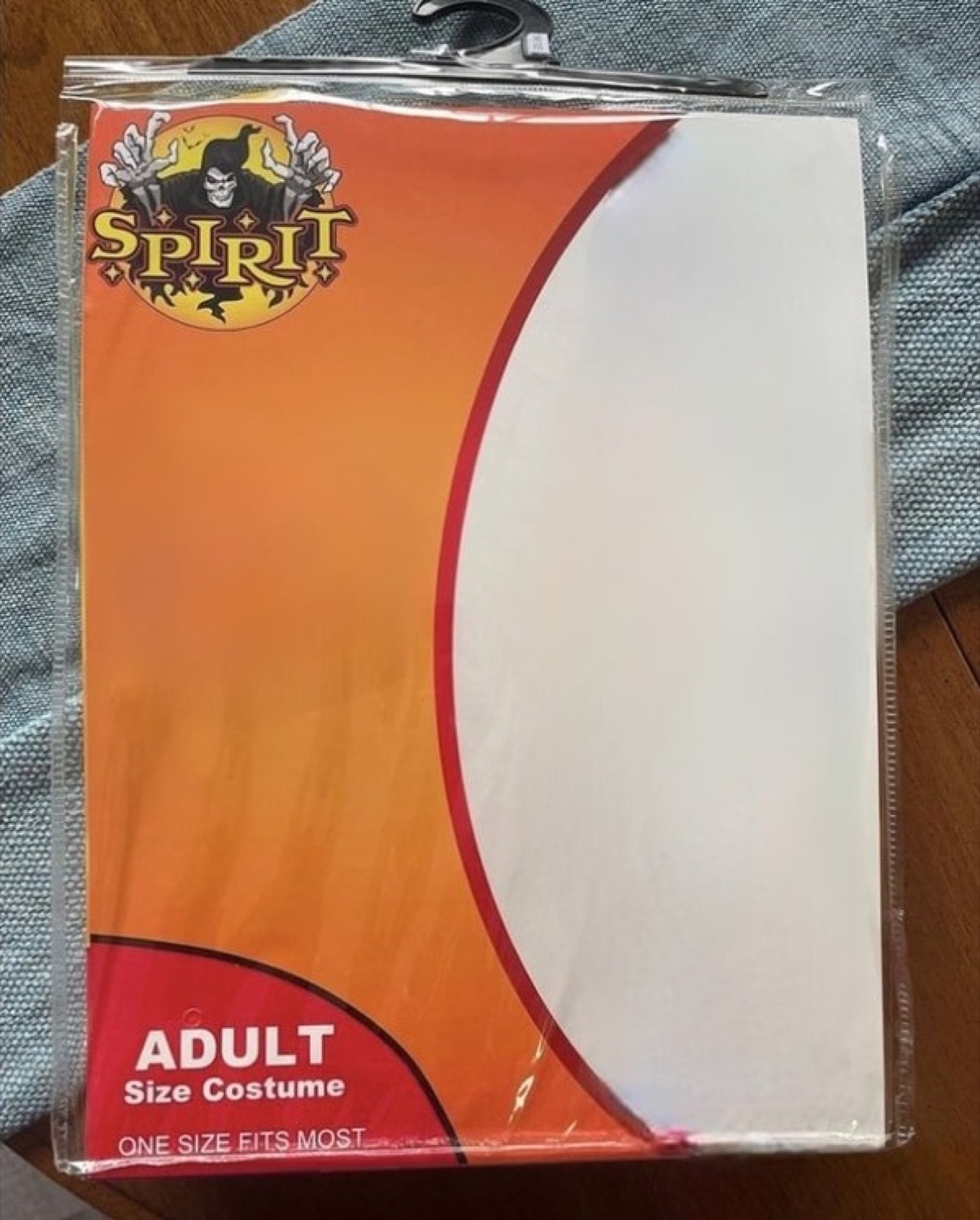 A blank Spirit Halloween adult costume package with an empty label