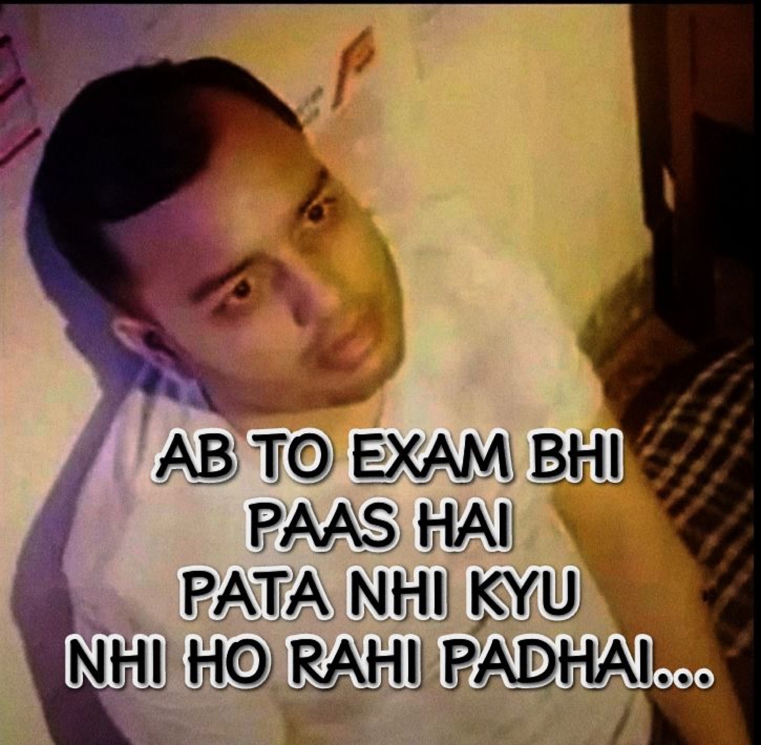 Man lying in bed staring blankly: 'AB TO EXAM BHI PAAS HAI PATA NHI KYU NHI HO RAHI PADHAI...' (exam's close and I still can't study)