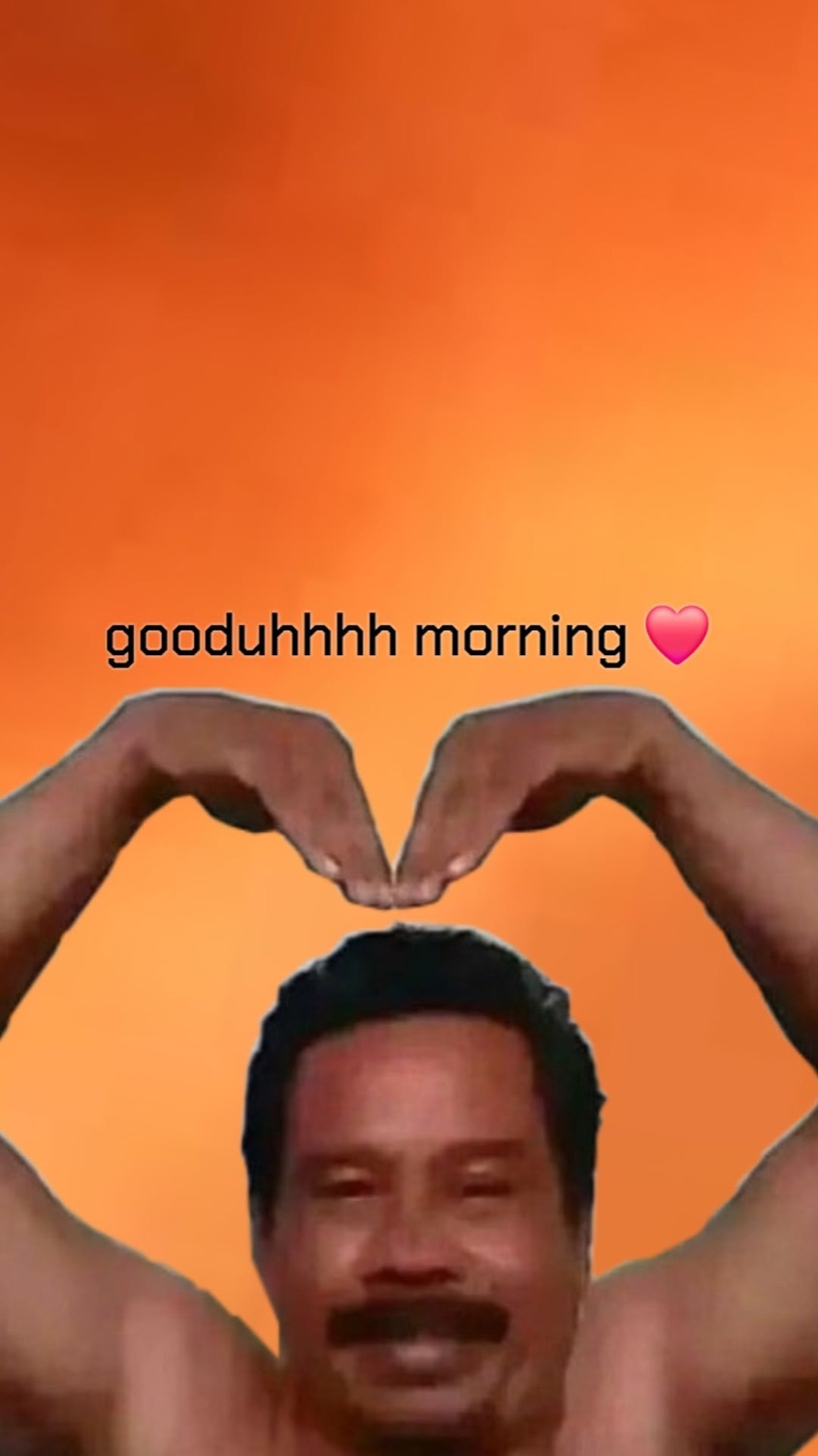 Man making a heart with his arms: 'gooduhhhh morning'