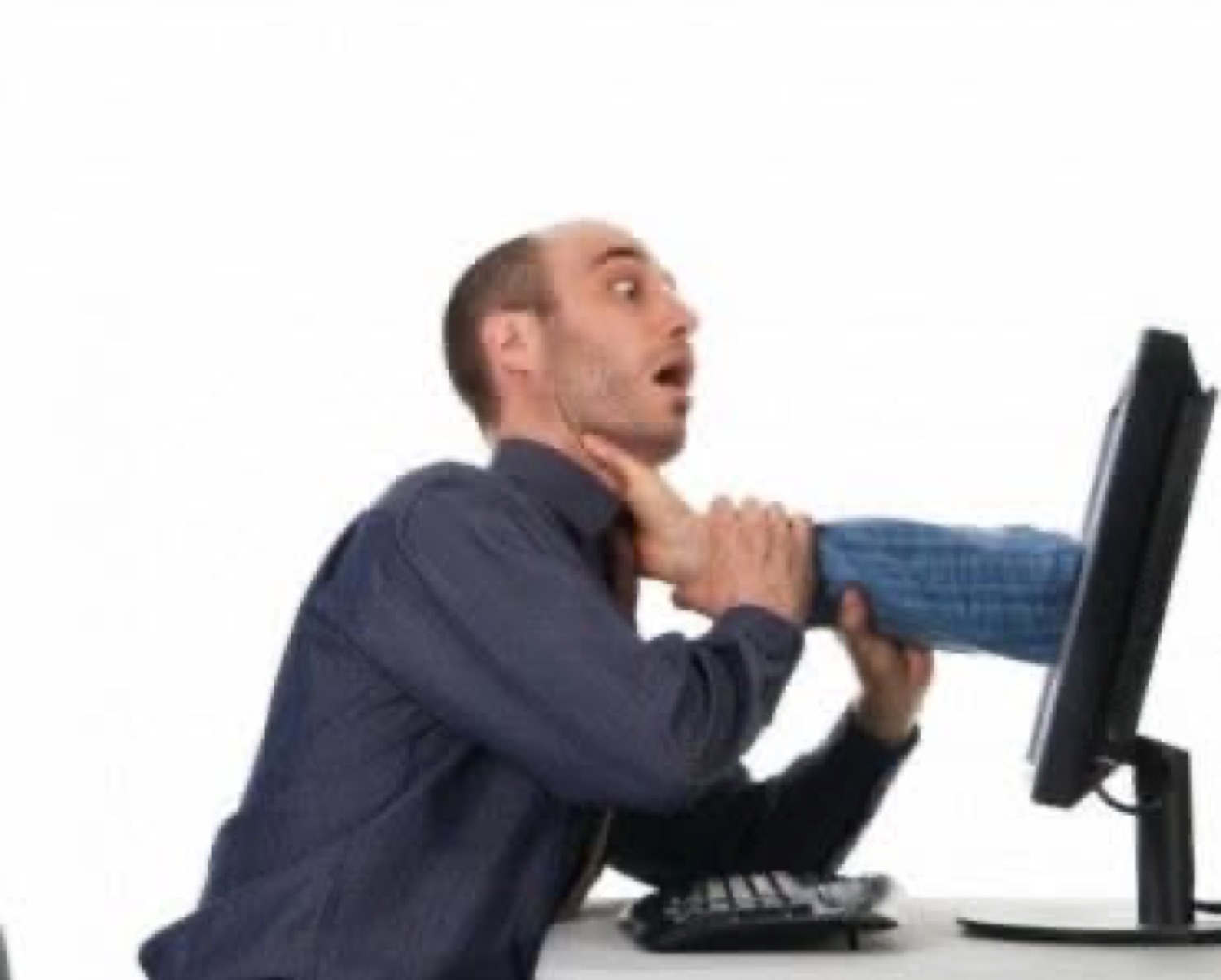 Man getting grabbed by the collar through a computer monitor screen, looking absolutely horrified