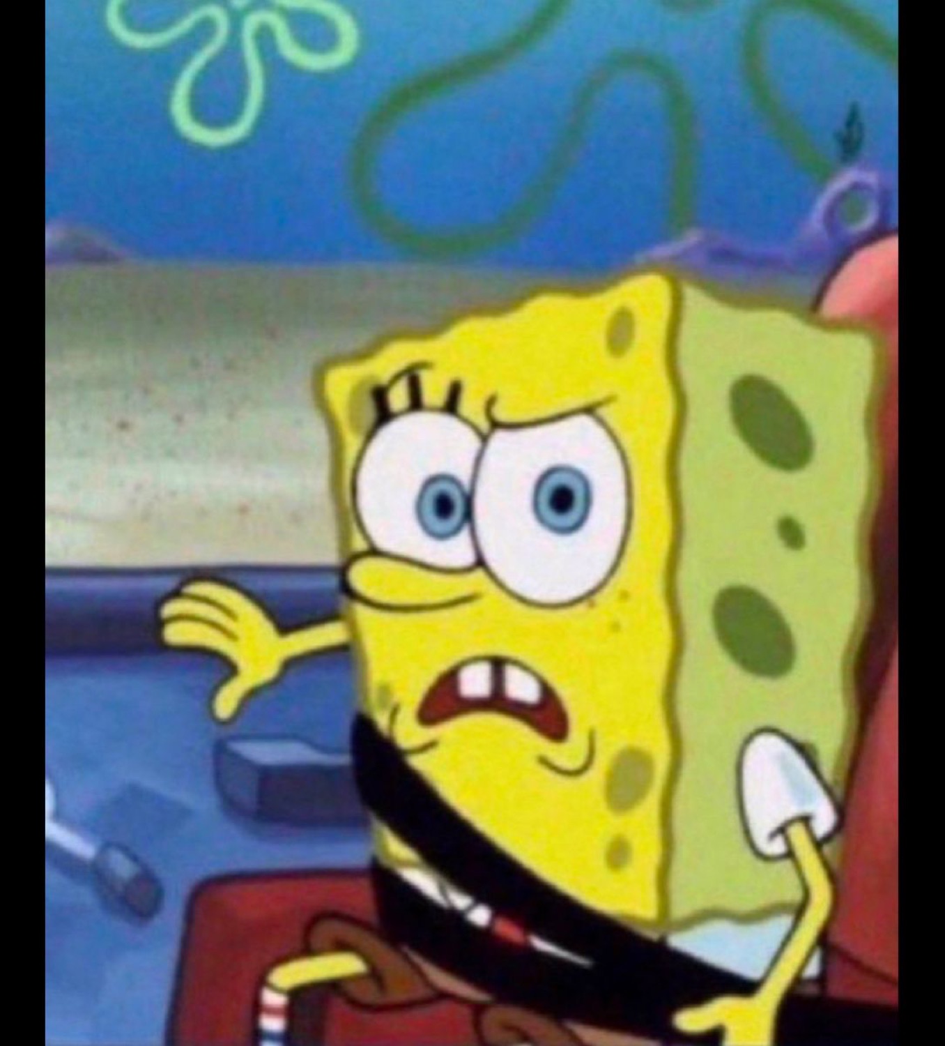 SpongeBob mid-shrug with a confused, uneasy grimace like he has no idea what's going on