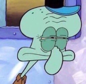 Squidward with eyes shut pinching his nose, deeply annoyed