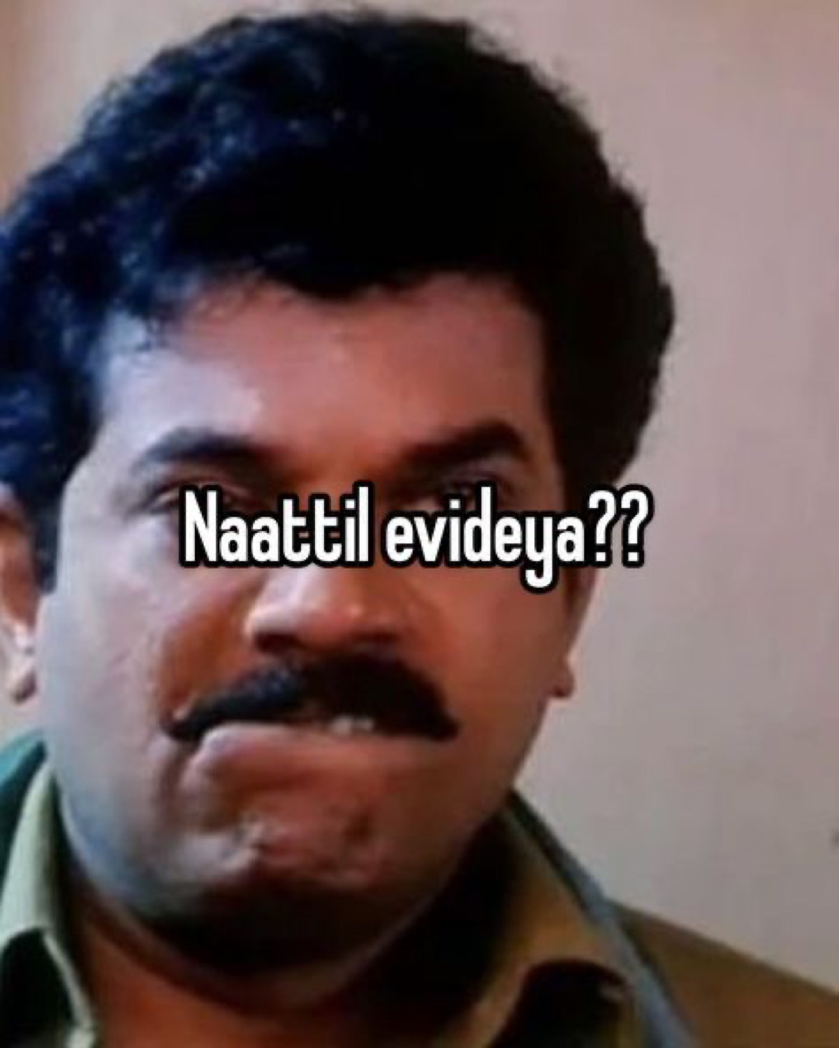 Man with a suspicious frown: 'Naattil evideya??' (where in your hometown?)