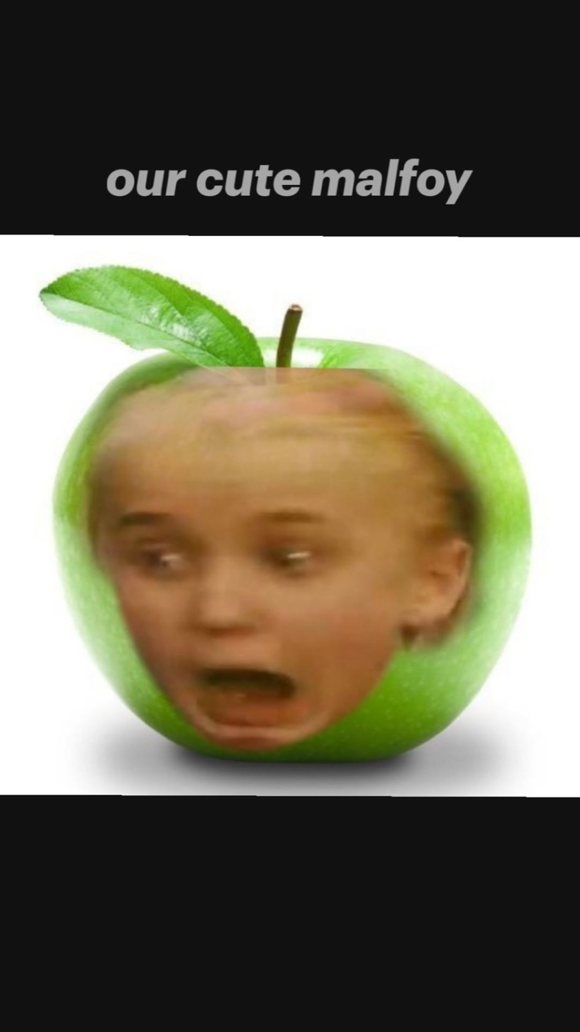 Young Draco Malfoy's shocked face edited onto a green apple under 'our cute malfoy'