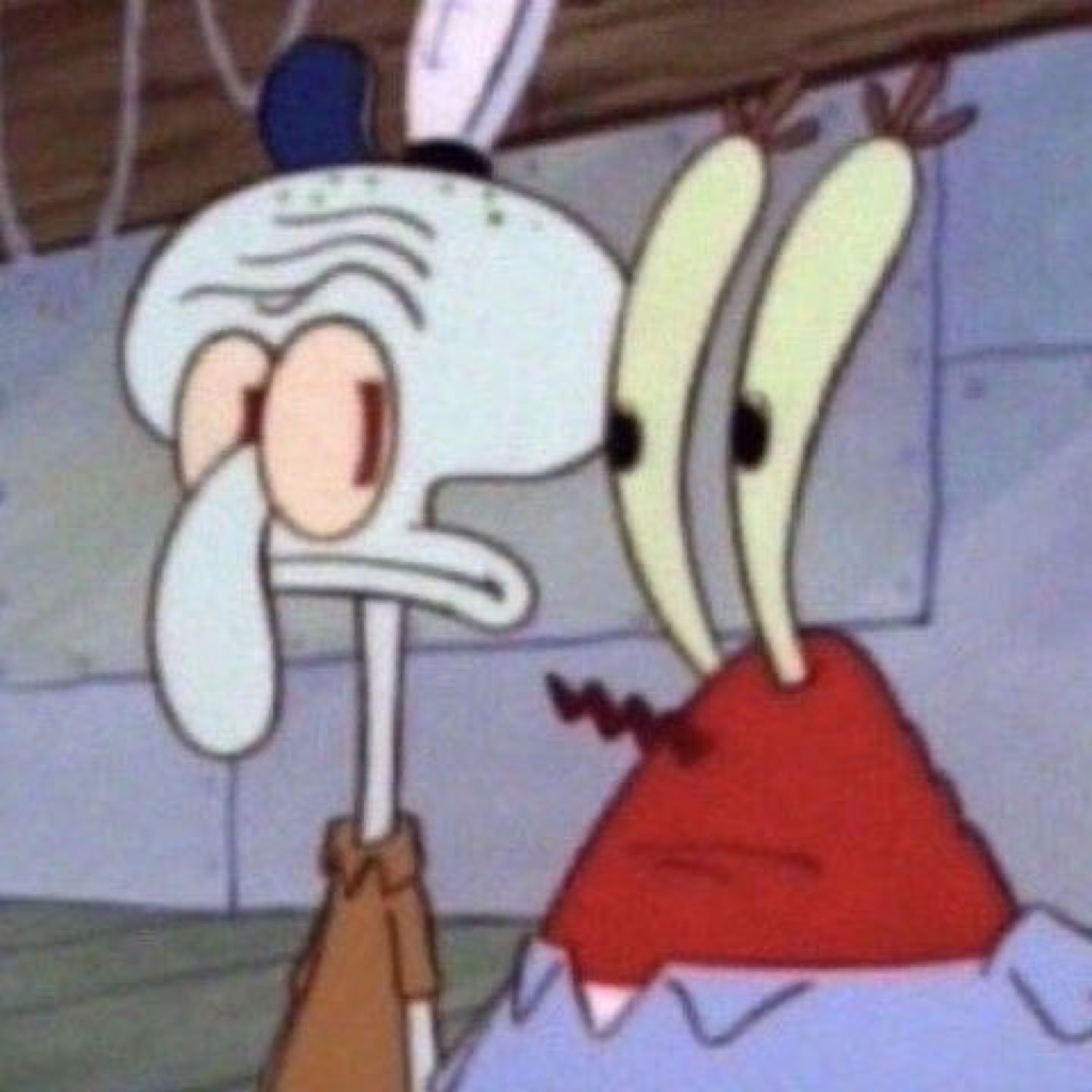 Squidward and Mr. Krabs looking utterly done and miserable together