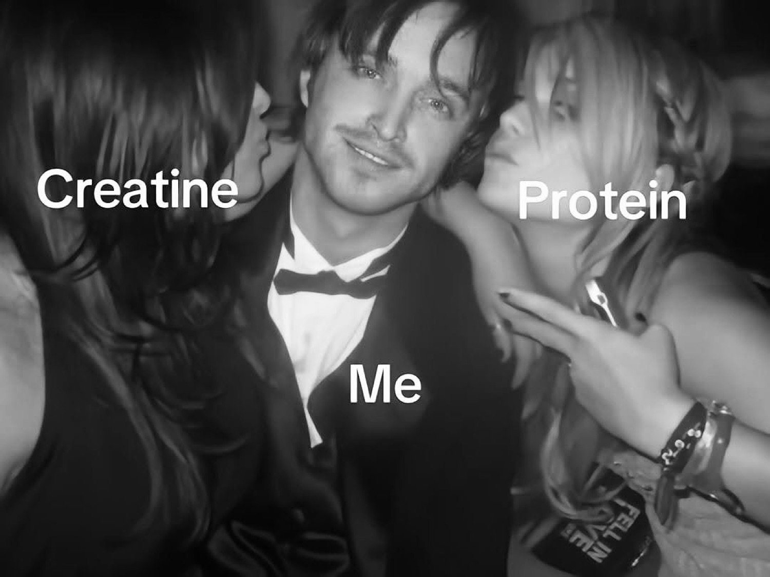 Black-and-white Jesse Pinkman between two women: 'Creatine / Me / Protein'