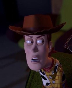 Woody from Toy Story frozen mid-gasp with wide alarmed eyes