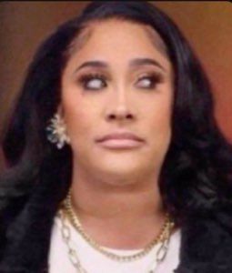 A woman rolling her eyes back with an exhausted, done-with-it expression