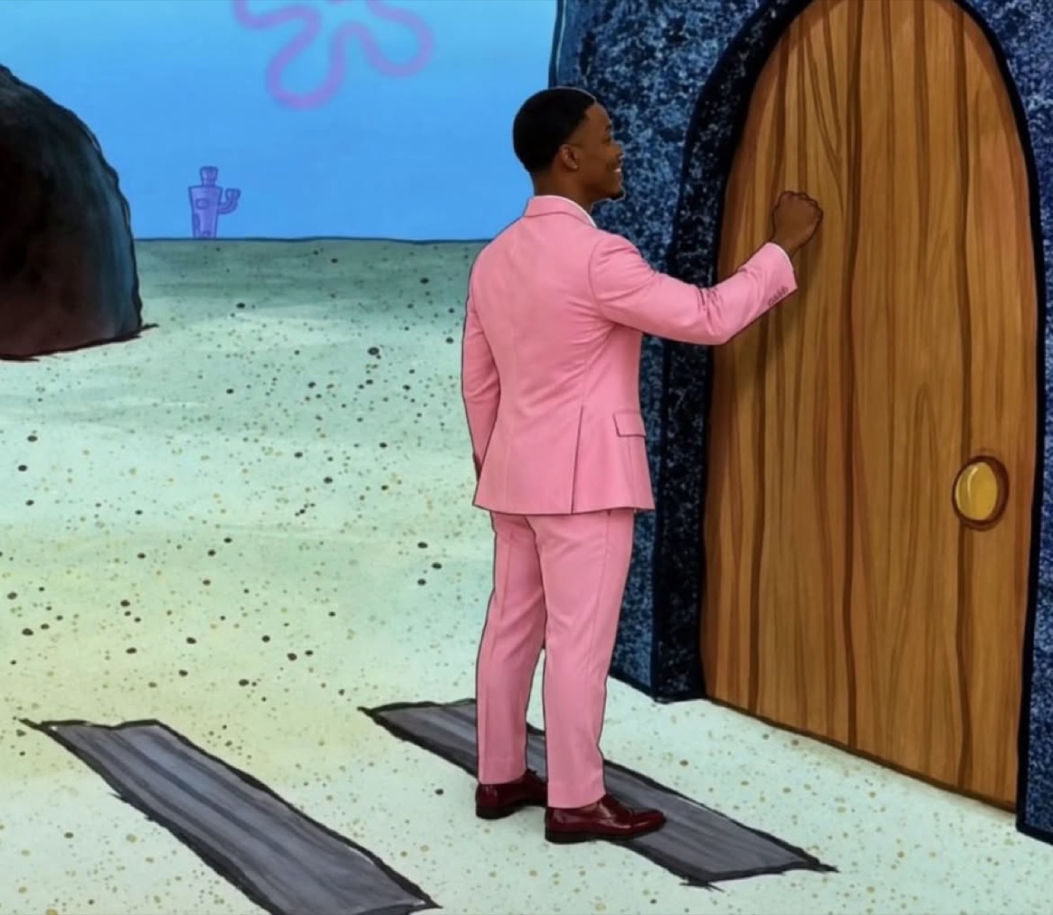 Love Island islander in a pink suit knocking on SpongeBob's pineapple door