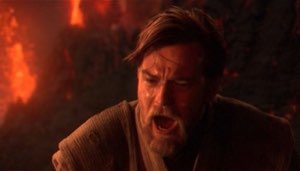 Obi-Wan Kenobi shouting in anguish against a wall of lava