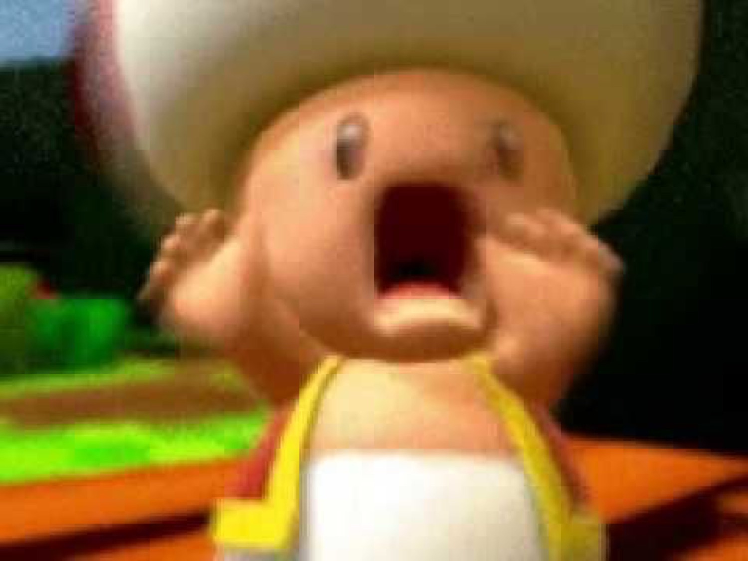 Toad from Mario screaming in terror with hands on his face