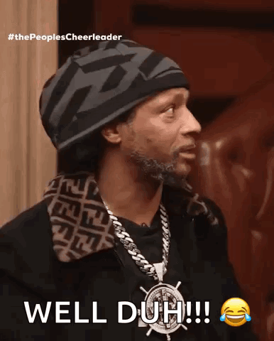 Katt Williams in a beanie and chains saying "Well duh!!!"