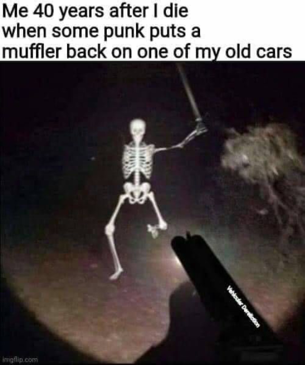 Skeleton shaking its fist in a flashlight beam under 'Me 40 years after I die when some punk puts a muffler back on one of my old cars'