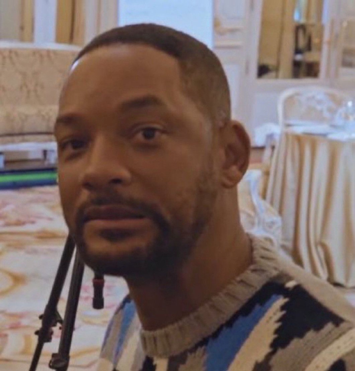 Will Smith looking worn out and quietly disappointed, on the edge of tears