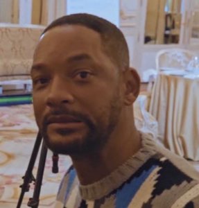 Will Smith looking worn out and quietly disappointed, on the edge of tears