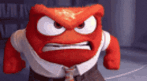 Anger from Inside Out gritting his teeth until his head bursts into flames