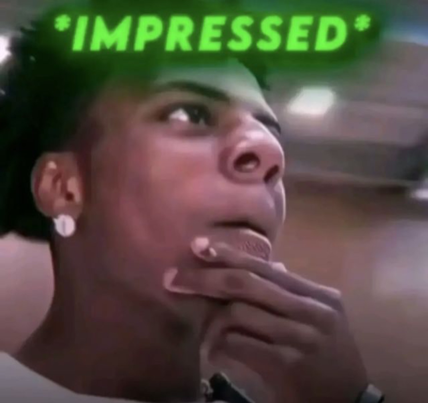 IShowSpeed with a hand on his chin: '*IMPRESSED*'