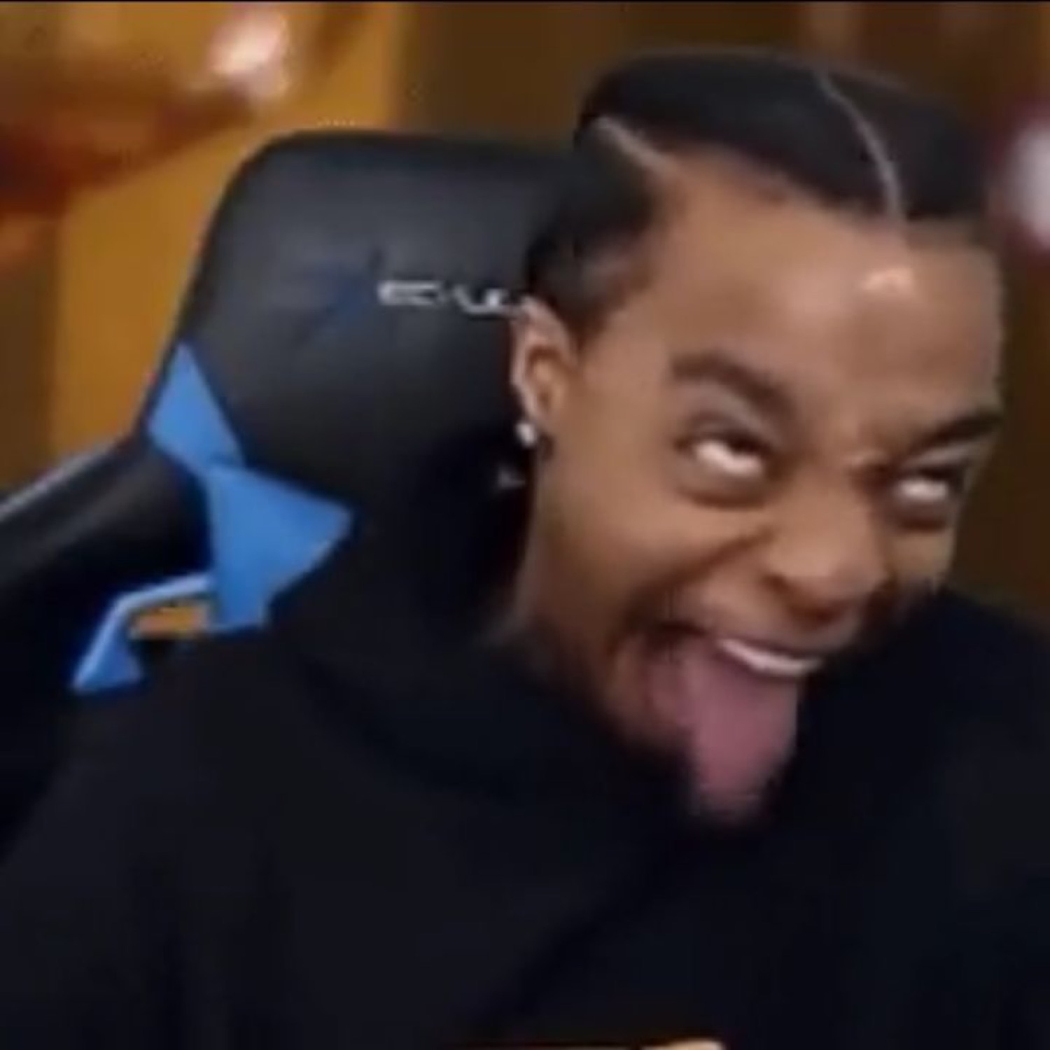 Streamer with his tongue out and eyes rolled back