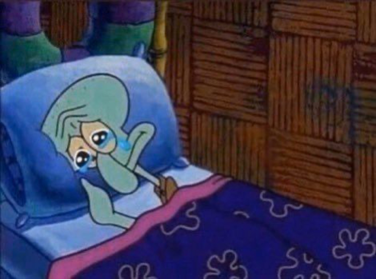Squidward lying awake in bed with a single tear, quietly miserable