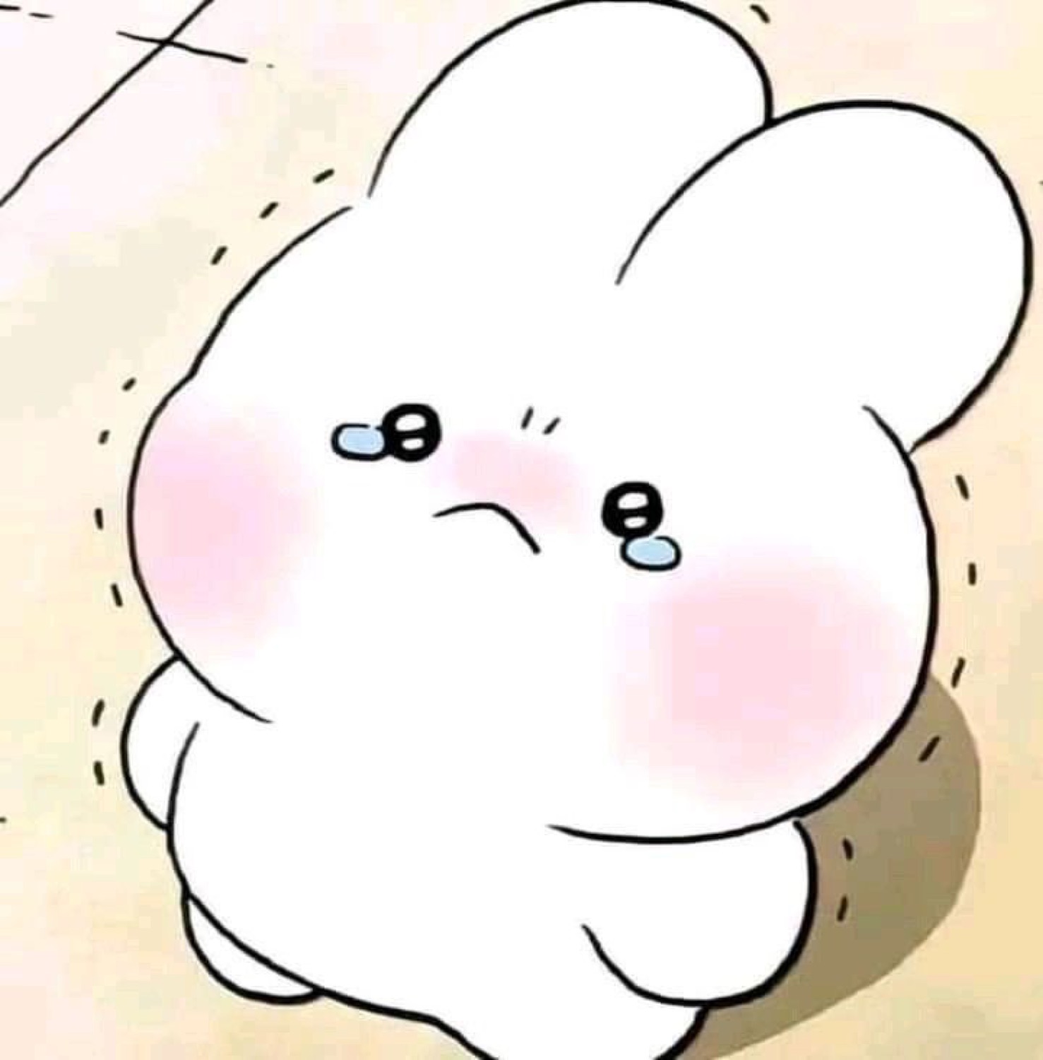 Cute cartoon bunny with rosy cheeks and teary eyes looking sad and pouty