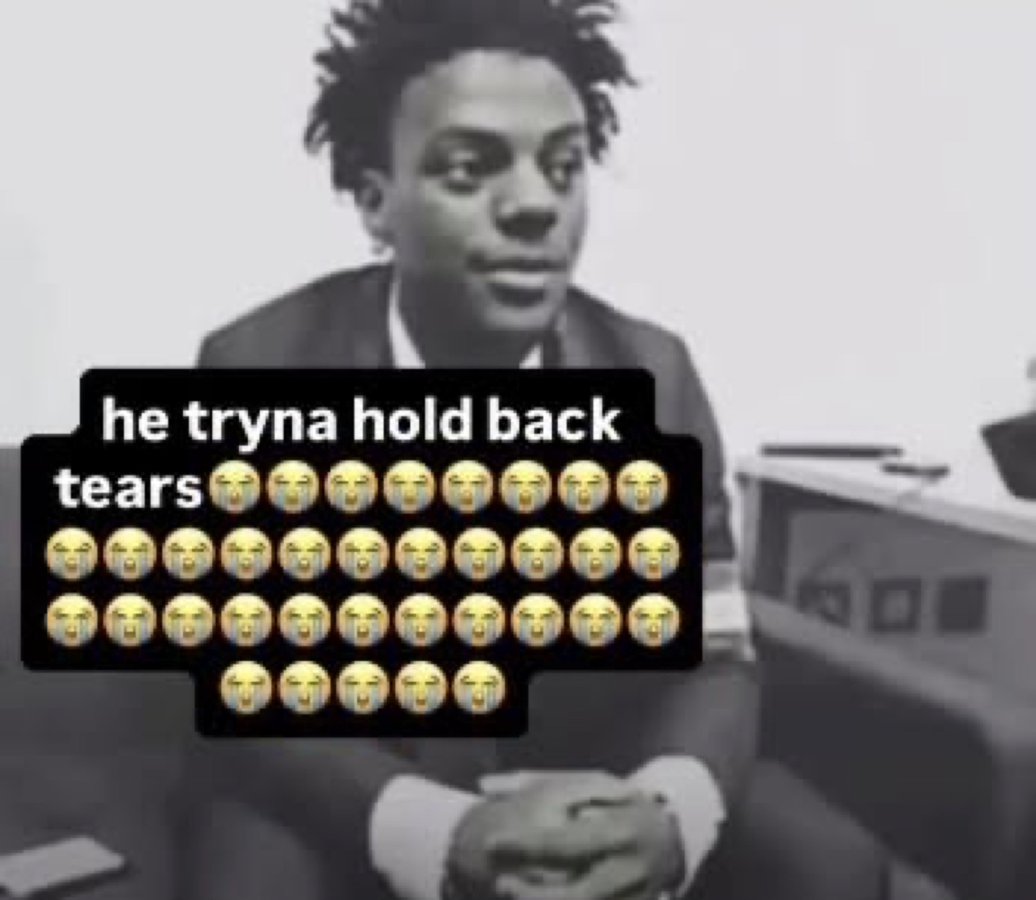 Black-and-white IShowSpeed staring stiffly under 'he tryna hold back tears' and a wall of crying emoji