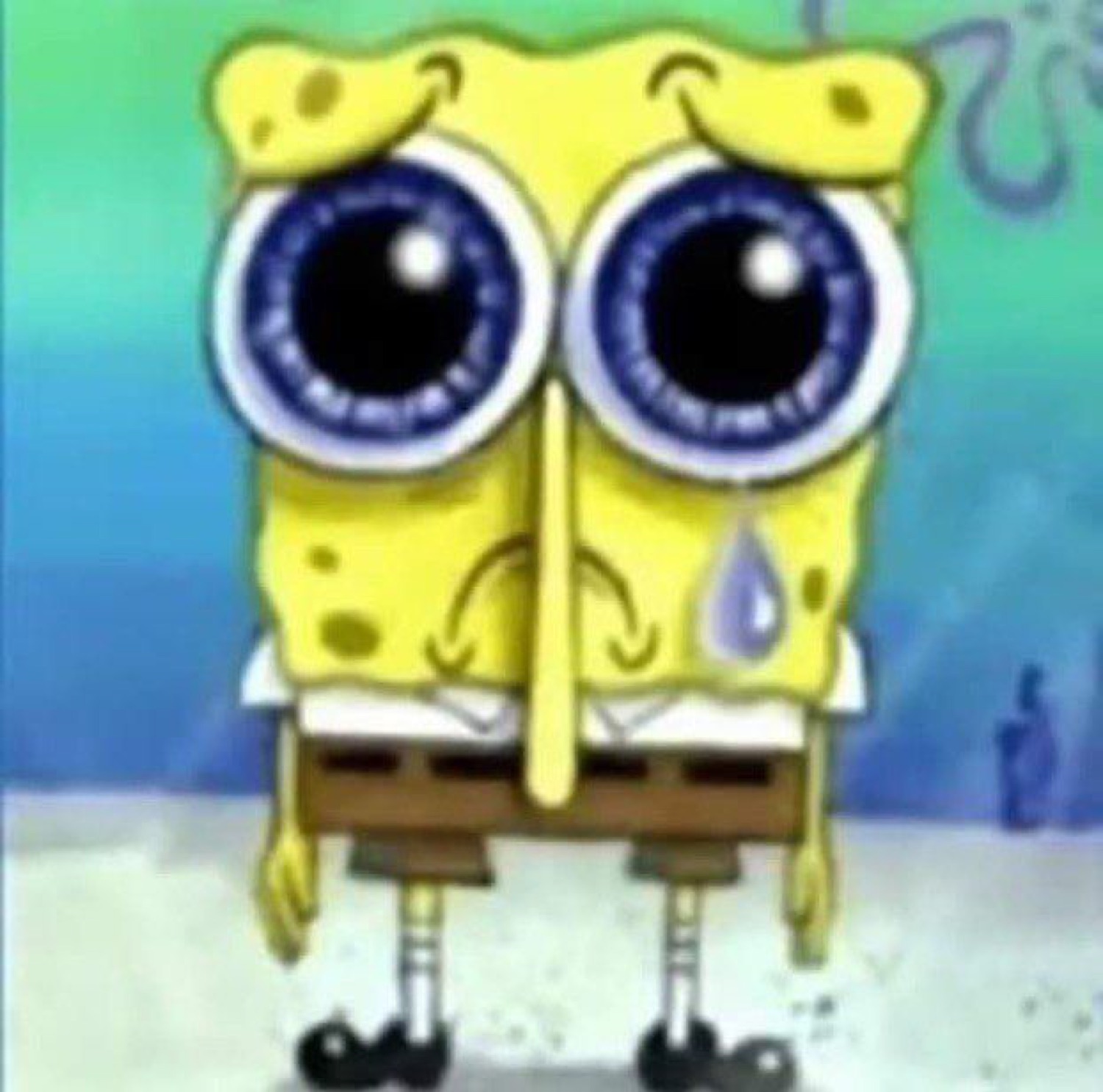 SpongeBob with enormous watery eyes and a single tear rolling down