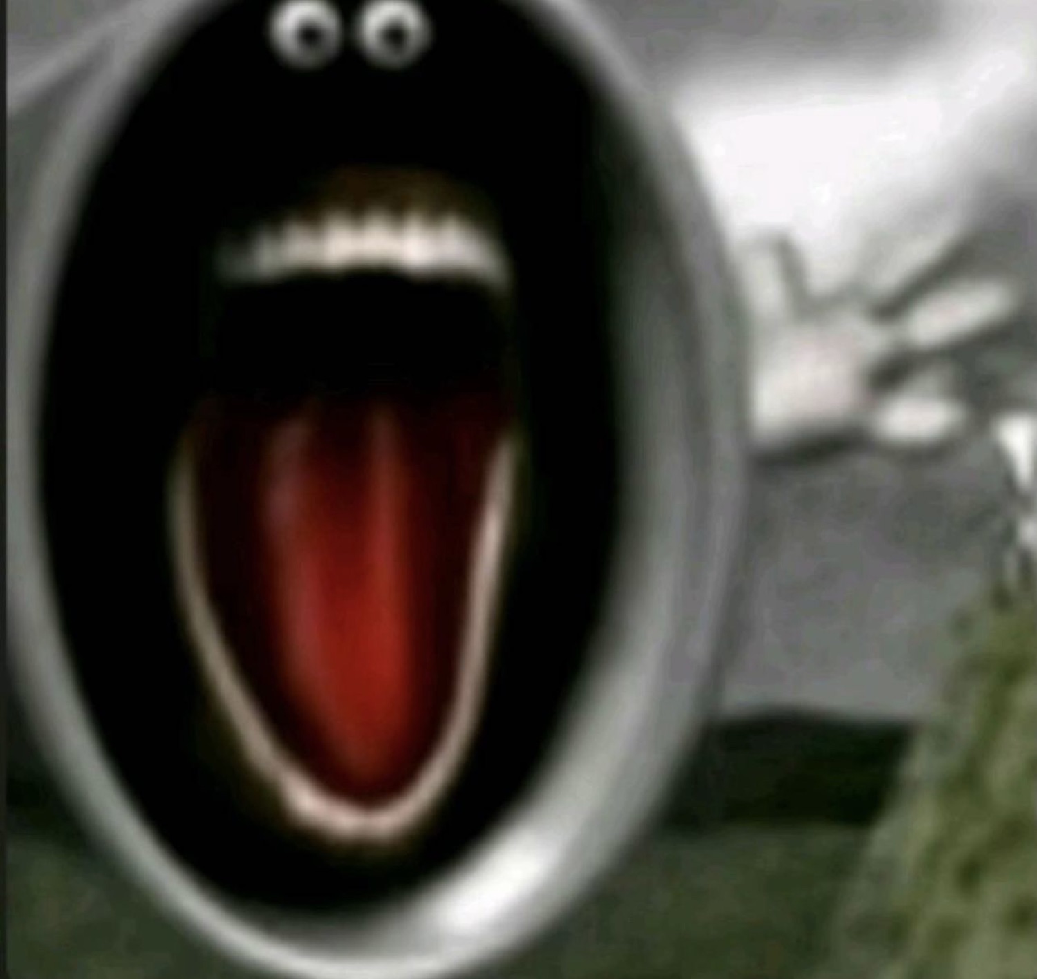 Cartoon car tailpipe with googly eyes screaming wide open